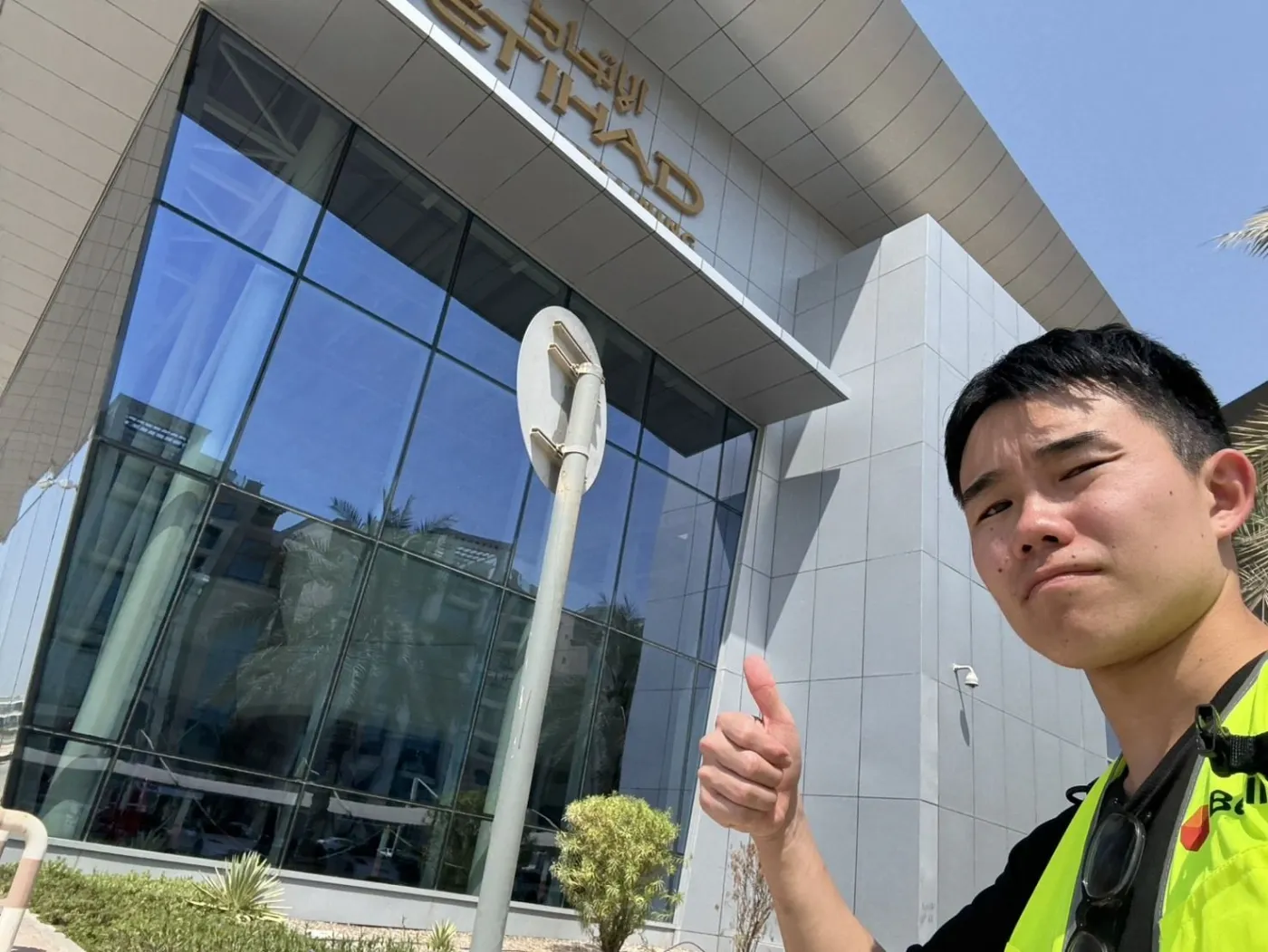 An associate outside the Etihad headquarters building in Abu Dhabi